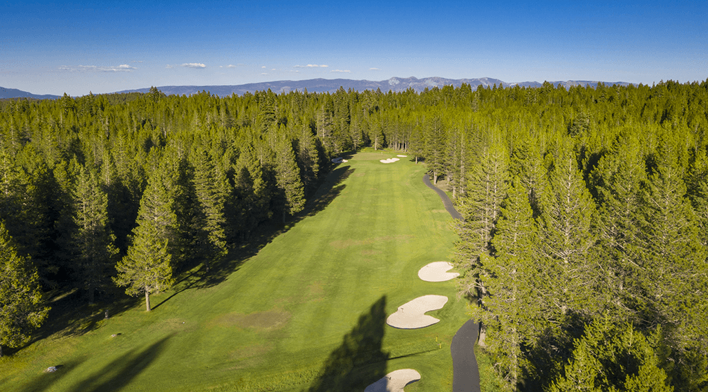 Aerial view of Tahoe Donner Golf Course framed by Truckee pine forest.